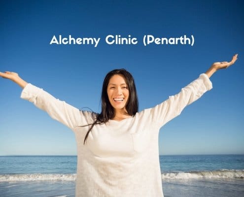 This is a picture of a happy lady, arms up high celebrating her success with at the Alchemy Hypnotherapy Clinic in Penarth.